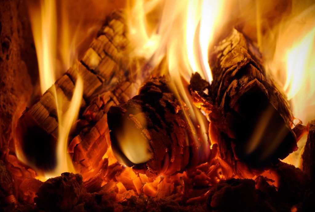 logs burning in a fireplace